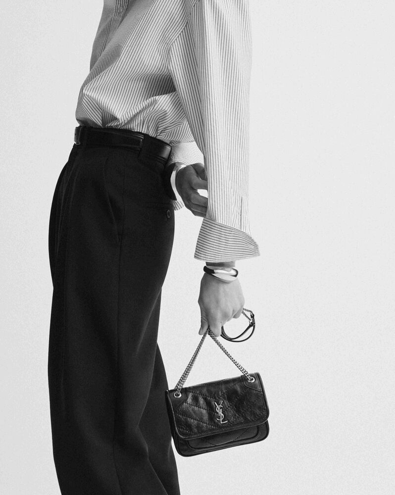 NIKI帆布和皮革迷你手袋