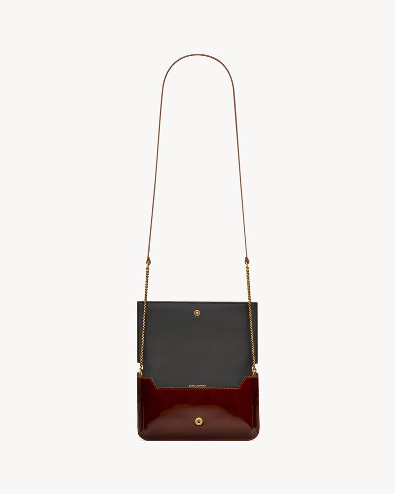 CASSANDRE SAINT LAURENT漆皮饰带手机包